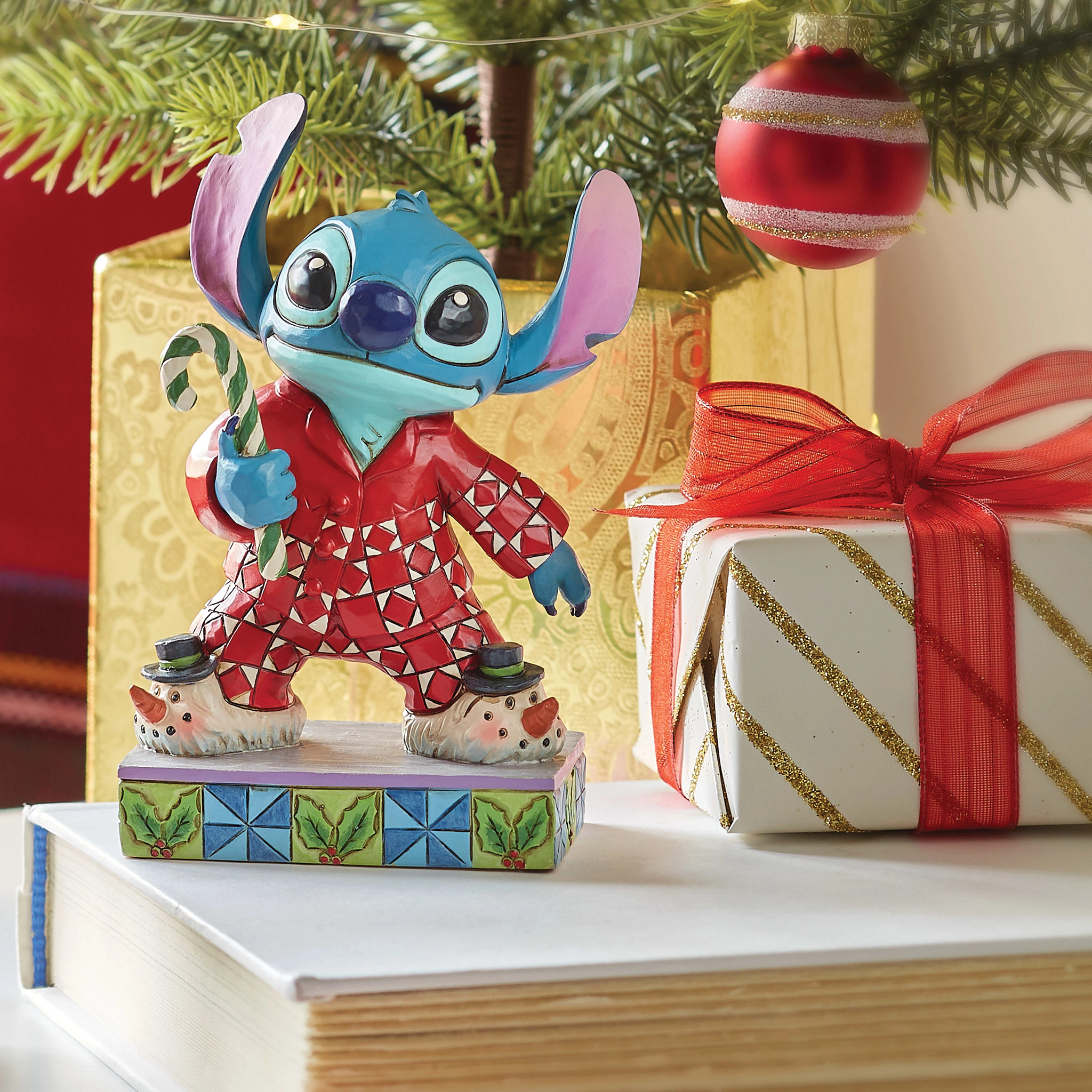 Disney Traditions - Stitch in Christmas Pajamas (Christmas Morning) figurine by Jim Shore 6015008